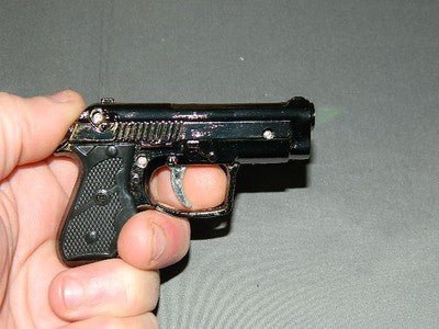 Super Sleek Pistol Gun Revolver Jet Torch Lighter With White LED Flash - Lighter Deals USA